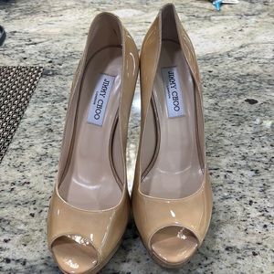 Size 40 Jimmy Choo heels worn once. 4 1/2 inch heel with platform